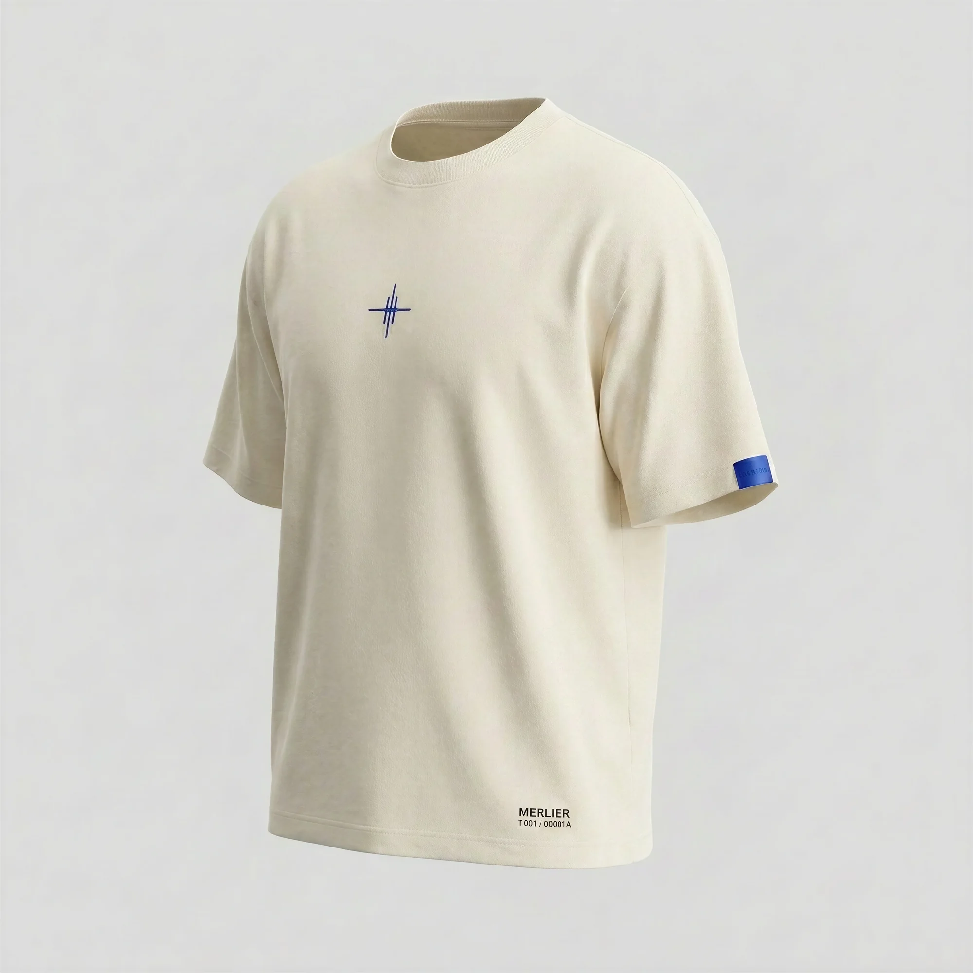 Front of T-001 / ORIGIN, with the symbol at the chest and the cobalt tag at the sleeve.